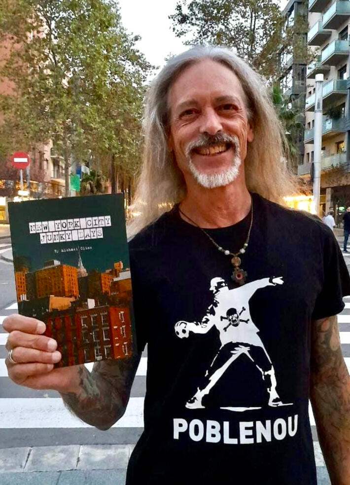 Photo of the author Michael Cline holding his book, NEW YORK CITY JUNKY DAYS Photo of the author Michael Cline holding his book, NEW YORK CITY JUNKY DAYS